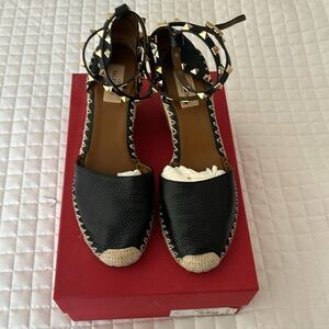 Valentino rock stud espadrille, barely worn. Black leather gold studs very rare